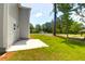 Spacious backyard with a concrete patio perfect for entertaining in your new home at 120 Mcmakin Dr # 16, Summerville, SC 29483