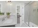 Bright bathroom featuring double vanity, marble floors, and glass enclosed shower at 120 Mcmakin Dr # 16, Summerville, SC 29483