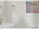 Clean bathroom with a round mirror, silver hardware, and a neutral color palette at 120 Mcmakin Dr # 16, Summerville, SC 29483