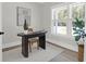Inviting home office with natural light, a modern black desk, and serene views of the outdoors at 120 Mcmakin Dr # 16, Summerville, SC 29483