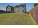 Spacious backyard featuring lush green grass and a well-maintained fence at 124 Sumac Dr, Goose Creek, SC 29445