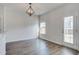 Dining area with modern light fixture, window, and an exit door at 124 Sumac Dr, Goose Creek, SC 29445
