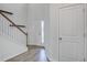 Bright entryway with staircase and wood-look flooring at 124 Sumac Dr, Goose Creek, SC 29445