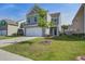 Beautiful two-story home with a well-kept lawn, paved driveway, and attached two-car garage at 124 Sumac Dr, Goose Creek, SC 29445
