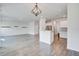 Open concept living space with kitchen view and stylish lighting at 124 Sumac Dr, Goose Creek, SC 29445