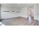 Minimalist living area with hardwood flooring and neutral walls at 124 Sumac Dr, Goose Creek, SC 29445
