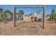 Playground featuring swings, a slide, and various play structures for outdoor fun at 124 Sumac Dr, Goose Creek, SC 29445