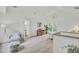 Bright bedroom with high ceilings, modern chandelier, and wood flooring at 126 Sparrow Dr, Isle of Palms, SC 29451