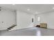 Spacious garage featuring bright lighting, storage cabinets, and easy access stairs at 126 Sparrow Dr, Isle of Palms, SC 29451