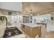 Gourmet kitchen with state-of-the-art appliances, a large island, and an open layout perfect for entertaining at 126 Sparrow Dr, Isle of Palms, SC 29451