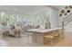 Bright and open living space featuring a large dining table and a comfortable seating area at 126 Sparrow Dr, Isle of Palms, SC 29451