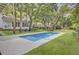 Beautiful pool with a surrounding patio, perfect for relaxation and outdoor gatherings at 126 Sparrow Dr, Isle of Palms, SC 29451