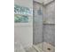 Stylish bathroom features a glass-enclosed shower and elegant tile work at 126 Sparrow Dr, Isle of Palms, SC 29451