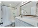 Bathroom with a large mirror and tub with shower at 1426 Tannery Row, Johns Island, SC 29455