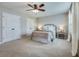 Bright bedroom featuring neutral walls, carpet and a bed with two closet doors at 1426 Tannery Row, Johns Island, SC 29455