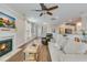 Bright living room with a fireplace, ceiling fan, and hardwood floors, blending comfort and style at 1426 Tannery Row, Johns Island, SC 29455