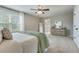 A primary bedroom features a dresser and mirror with a bathroom doorway visible at 1426 Tannery Row, Johns Island, SC 29455