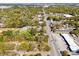 An aerial view of the neighborhood showcasing the street and surrounding trees at 1456 Remount Rd, North Charleston, SC 29406