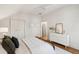 Well-lit bedroom with a queen size bed, dresser and mirror, closet and natural lighting at 1456 Remount Rd, North Charleston, SC 29406
