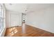 Bright bedroom with natural light, hardwood floors, and spacious closet at 1456 Remount Rd, North Charleston, SC 29406