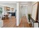 Spacious home interior with hardwood floors, showcasing the kitchen, hallway, and staircase at 1456 Remount Rd, North Charleston, SC 29406