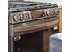 Close-up of a stainless steel stove with modern knobs and a sleek, black oven door at 1456 Remount Rd, North Charleston, SC 29406