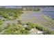 Stunning aerial view of a waterfront home with private docks and lush green surroundings at 146 Rivers Edge Way, Wando, SC 29492