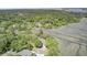 Gorgeous aerial view showing the property surrounded by water access and lush trees at 146 Rivers Edge Way, Wando, SC 29492