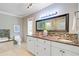 Bathroom featuring double sinks, granite countertops and great lighting at 146 Rivers Edge Way, Wando, SC 29492