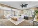 Spacious primary bedroom offers natural light and a seating area at 146 Rivers Edge Way, Wando, SC 29492