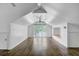 Spacious bonus room featuring hardwood floors, recessed lighting, and large windows offering bright natural light at 146 Rivers Edge Way, Wando, SC 29492