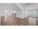 Bonus room with hardwood flooring, sloped ceiling, and plenty of natural light from the windows at 146 Rivers Edge Way, Wando, SC 29492