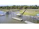 A long pier with multiple boat docks, offering easy access to the open water at 146 Rivers Edge Way, Wando, SC 29492