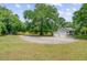Cozy home with a large yard, a private driveway and a two-car garage at 146 Rivers Edge Way, Wando, SC 29492