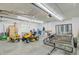 Spacious garage featuring a riding lawn mower and ample storage space for tools and equipment at 146 Rivers Edge Way, Wando, SC 29492
