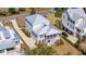An aerial view showing the home's location, roof, driveway, and neighboring houses at 1604 Bernier Commons, Johns Island, SC 29455