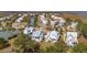 A sprawling community boasts charming homes, picturesque waterways, and abundant greenery at 1604 Bernier Commons, Johns Island, SC 29455