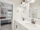 Modern bathroom boasts double vanity and is adjacent to a bedroom at 1604 Bernier Commons, Johns Island, SC 29455
