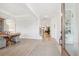 Open foyer with dining area, hardwood floors, and natural light from the front door at 1604 Bernier Commons, Johns Island, SC 29455