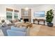 Comfortable living room showcasing a fireplace, textured rug, and plush seating at 1604 Bernier Commons, Johns Island, SC 29455