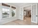 Office with natural light and hardwood floors, adjoined with dining area through french doors at 1604 Bernier Commons, Johns Island, SC 29455