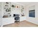 Office space featuring custom shelving with designer wallpaper and light hardwood flooring at 1604 Bernier Commons, Johns Island, SC 29455