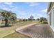 Beautiful backyard with a brick patio and water view at 170 Sea Lavender Ln, Summerville, SC 29486