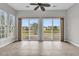 Bright sun room with tile floors and a ceiling fan at 170 Sea Lavender Ln, Summerville, SC 29486