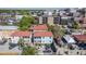 A high angle bird's eye view of the property showing the surrounding neighborhood at 172 Saint Philip St # F, Charleston, SC 29403