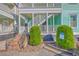 Home exterior featuring a staircase leading to a white balcony at 172 Saint Philip St # F, Charleston, SC 29403