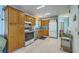 Functional kitchen with wood cabinets and stainless steel appliances at 172 Saint Philip St # F, Charleston, SC 29403