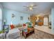 Cozy living room flows into an open kitchen space at 172 Saint Philip St # F, Charleston, SC 29403