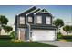 Charming two-story home with a two-car garage and beautiful landscaping at 180 Surfbird Rd # 640, Summerville, SC 29486