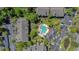 Aerial view of a complex with a pool and mature landscaping in a wooded area at 188 Midlands Pkwy # 507, Summerville, SC 29485